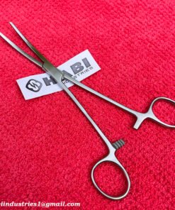 Curved hemostatic forceps with ratchet lock