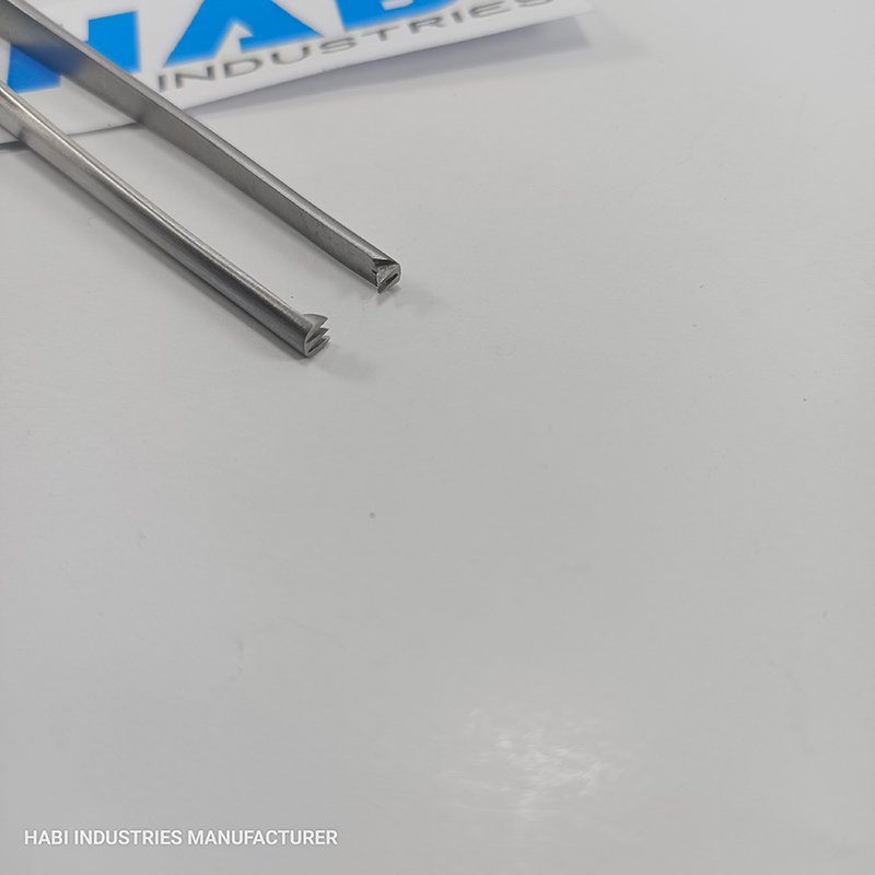 Toothed Tissue Forceps Tip Detail Toothed tissue forceps tip close-up